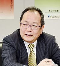 Mr. Munehisa Fujimaki (General Manager of Fiber Optics Division)
